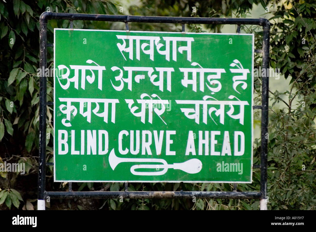 Double language road sign both Hindi and English Blind Curve Ahead India Stock Photo Alamy