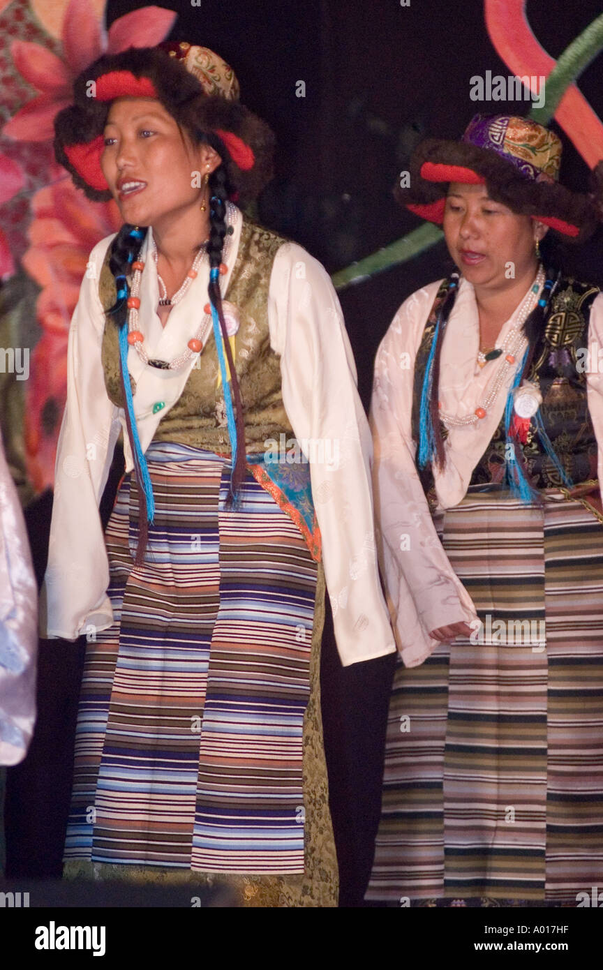 Group of female Sherpa dancers in traditional dress during Namchi