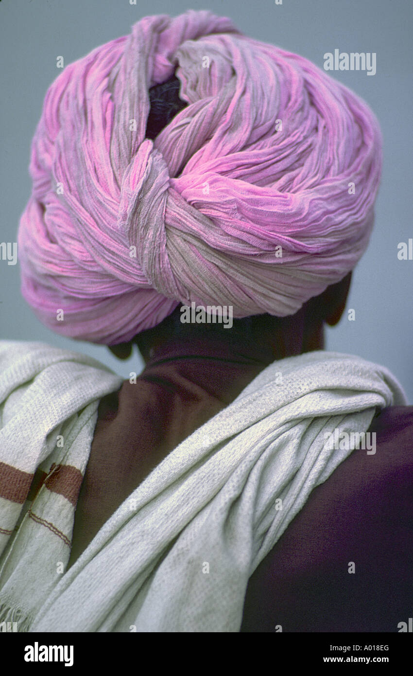 Indian man wearing pink turban, Mumbai India Stock Photo