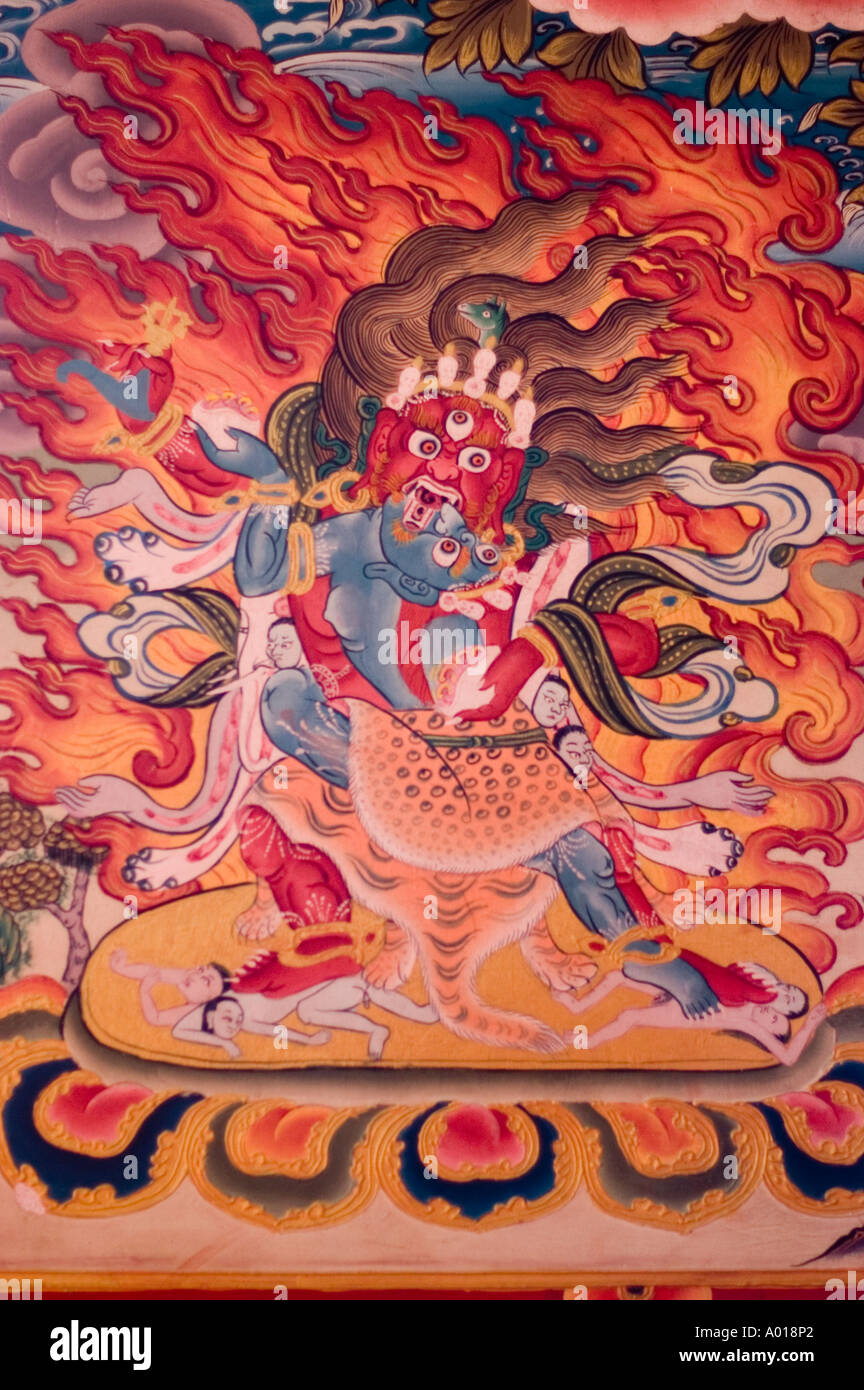 Red wrathful buddhist deity with consort yab yum mural painting Namchi Nyingma monastery Sikkim India Stock Photo