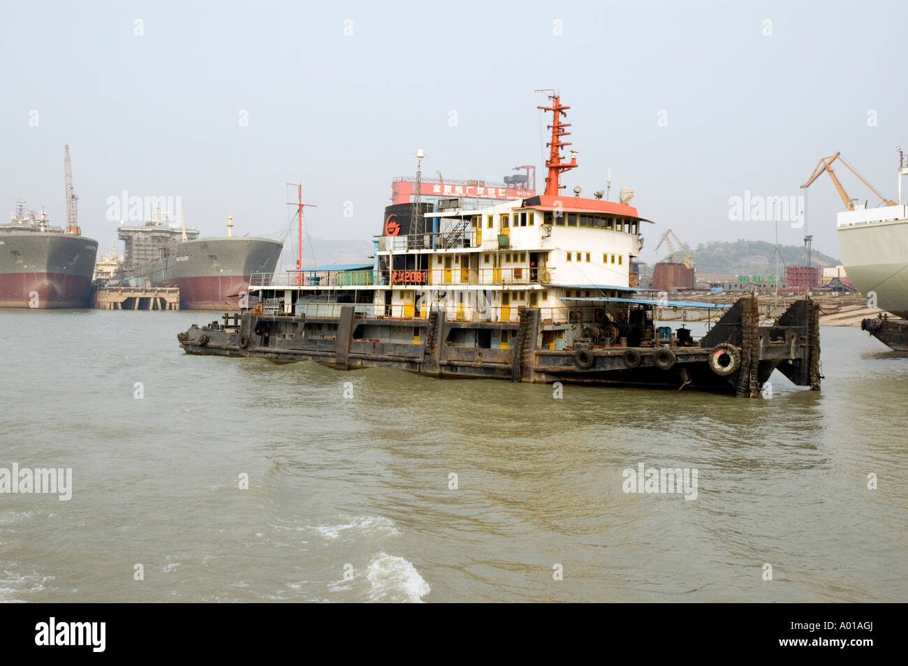 Multi-storey construction barge sailing on the Yangtze river, Nanjing Stock Photo