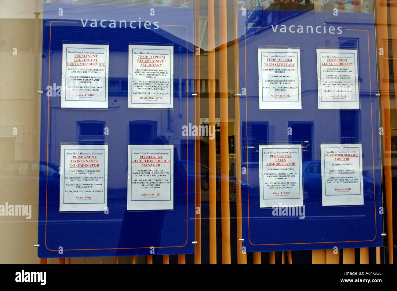 Job adverts placed in the window of a recruitment agency, England 