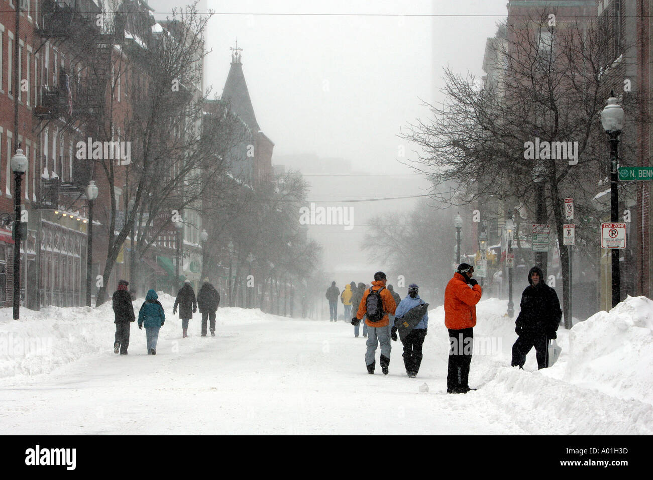 Pedestrians walk in the street in Bostons North End after a heavy snow Stock Photo