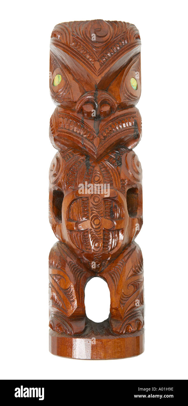 Maori wood carving eyes of Paua shell Stock Photo