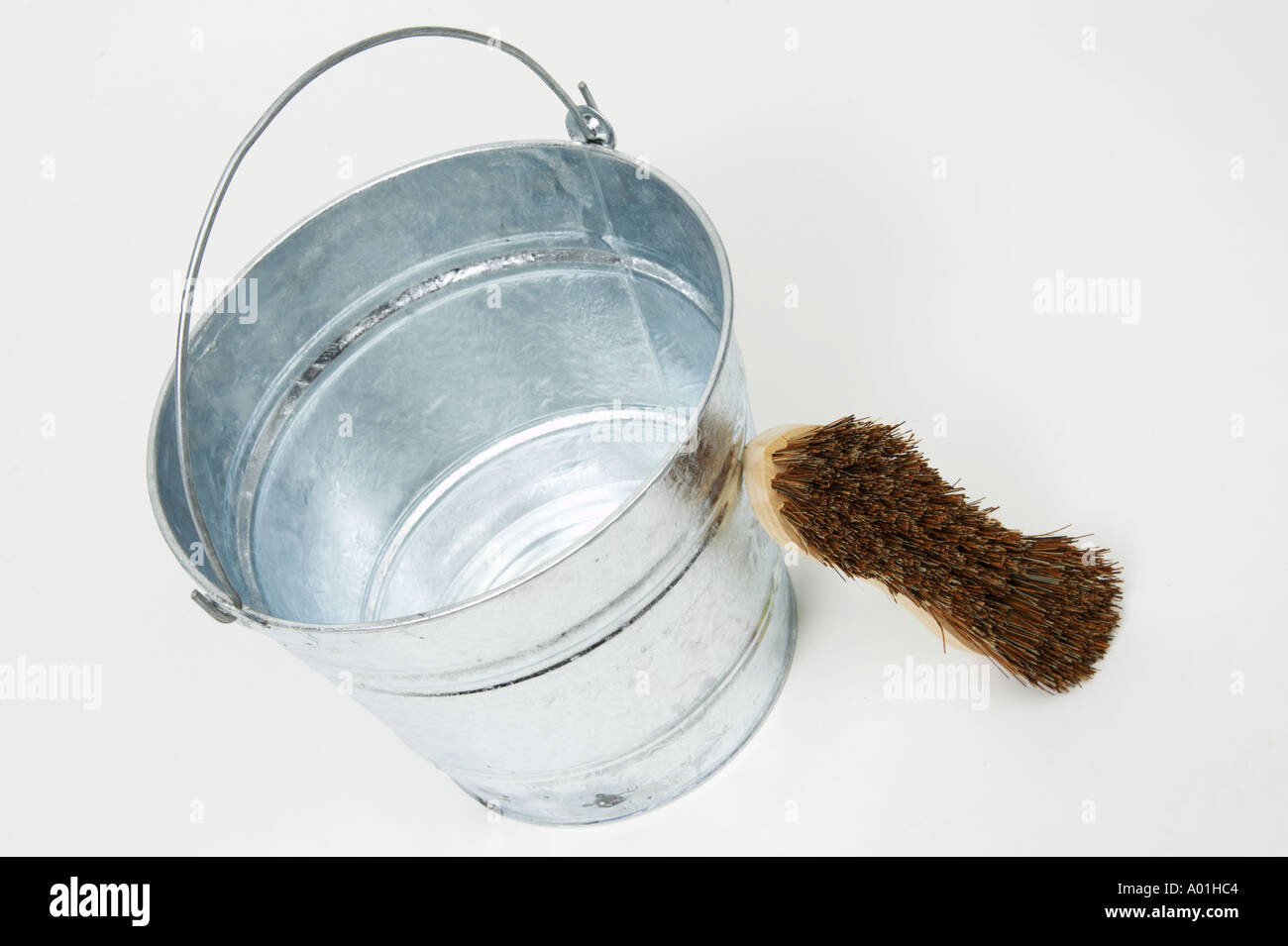 Galvanised steel bucket scrubbing brush working class concepts Stock