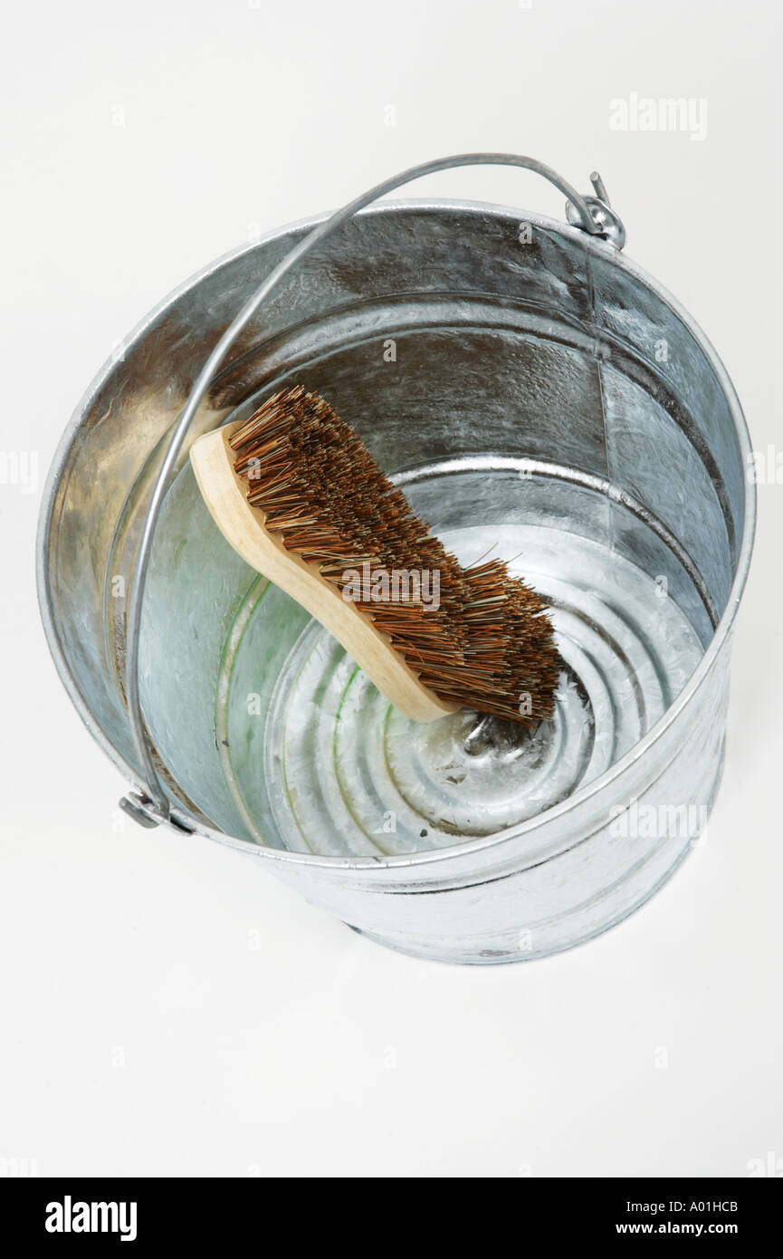 Galvanised steel bucket scrubbing brush Stock Photo Alamy