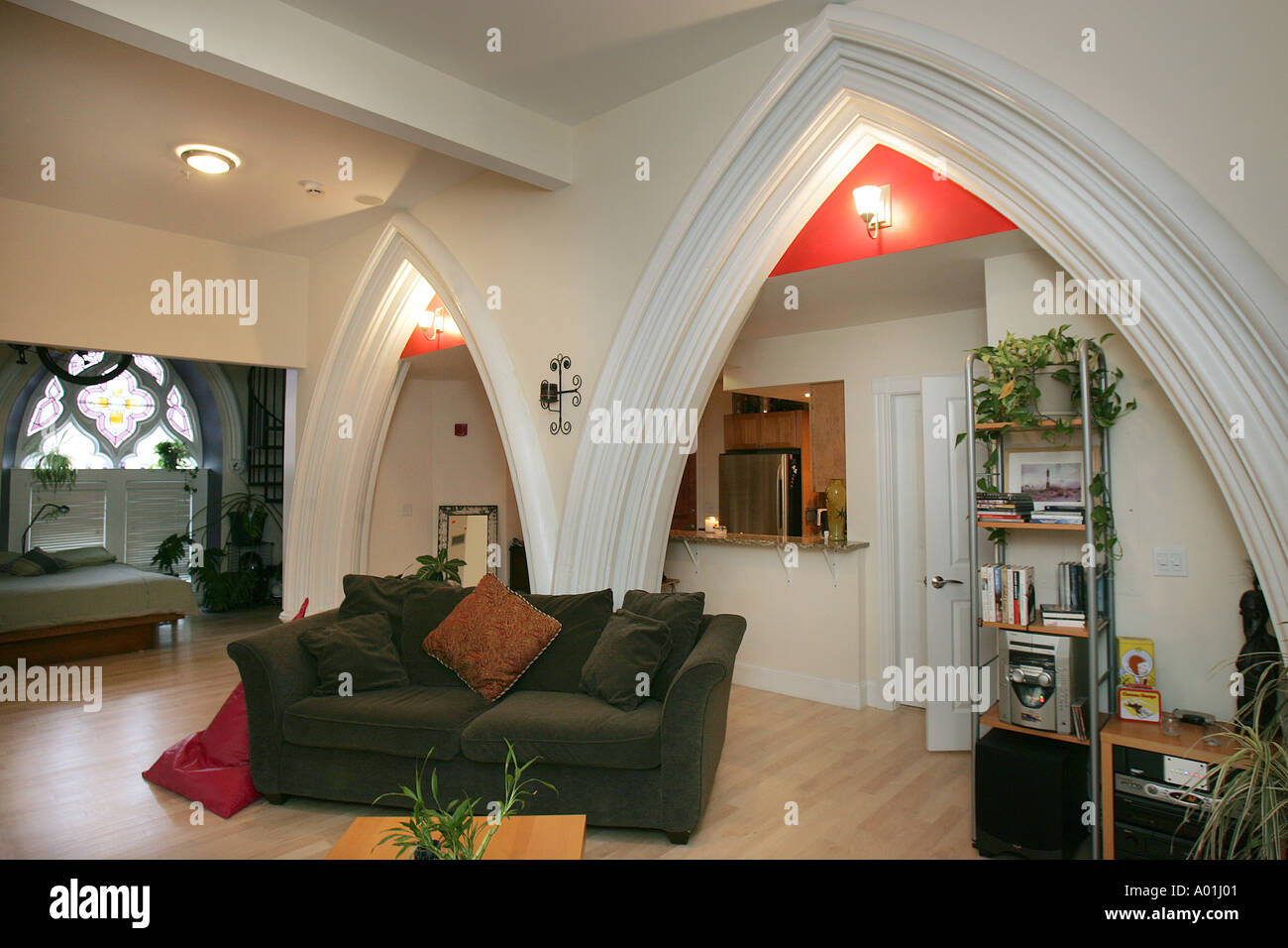 City apartment interior. The church building was converted into condominiums. Stock Photo