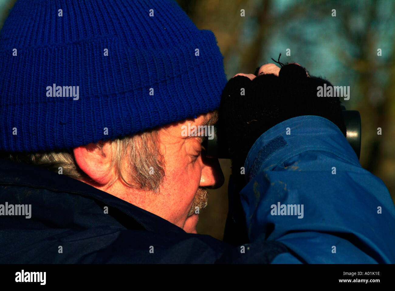 Man binoculars spying hi-res stock photography and images - Alamy