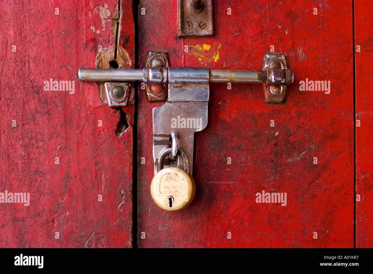 Close Up Of Traditional Old Indian Door Lock With Red Background
