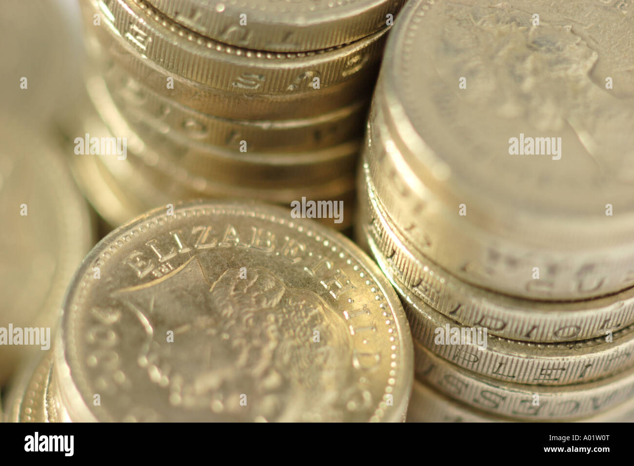 Pound coins in piles Stock Photo Alamy