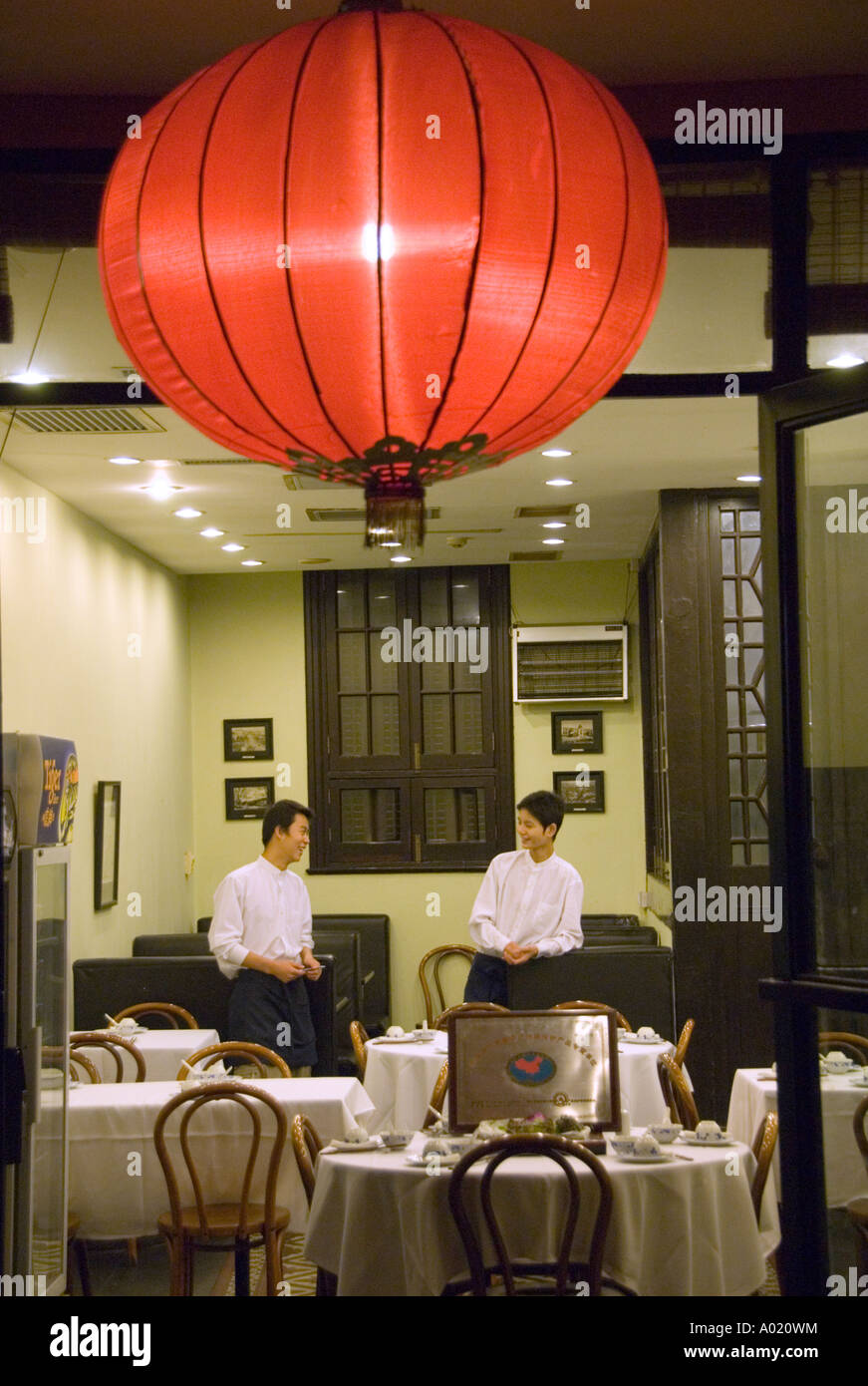 Looking into upmarket Chinese restaurant at night in trendy Xintiandi