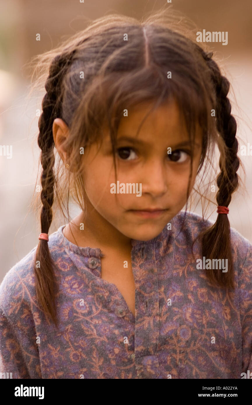Portrait of small Indian village girl looking at camera near Dharamsala  Himachal Pradesh India Stock Photo - Alamy