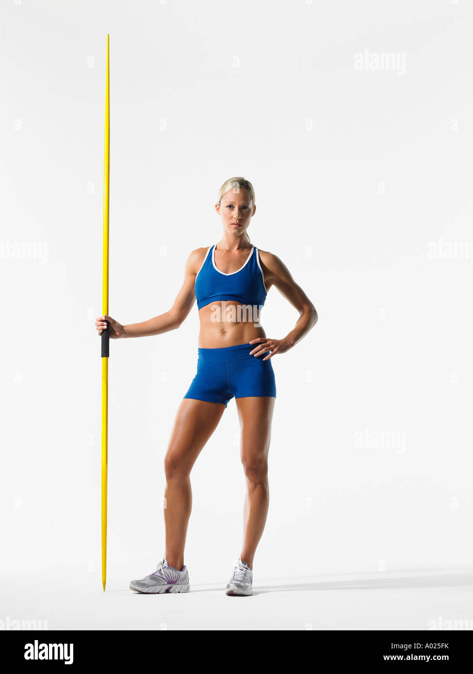 Female athlete holding javelin Stock Photo