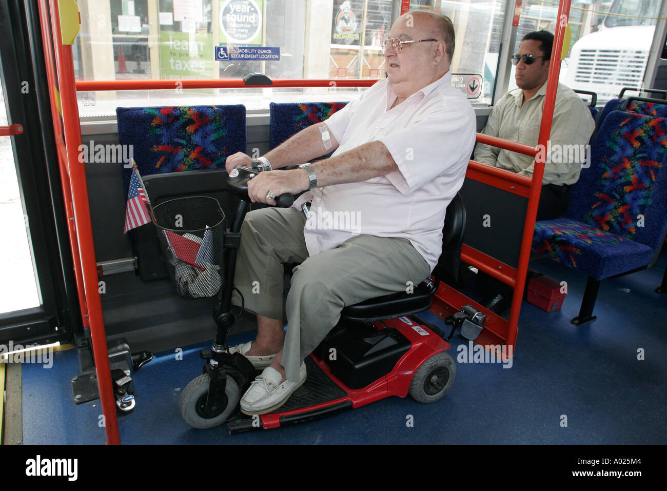 Miami Beach Florida,public bus,coach,senior seniors old citizen citizens pensioner pensioners retired elderly,White man,disabled disability handicappe Stock Photo