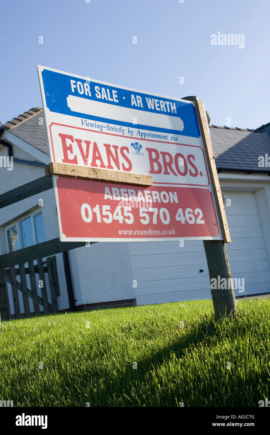 Evans Brothers estate agents sign house for sale Pennant village south