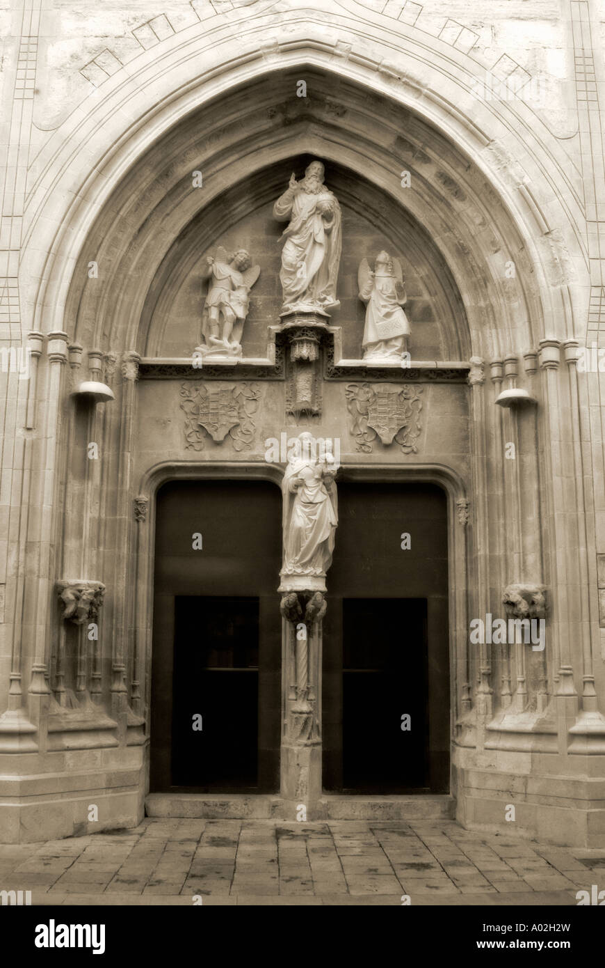 Door of Collegiate Church (14th 15th cent., Catalan Aragon Gothic Style).Gandía. Valencian Community. Spain Stock Photo