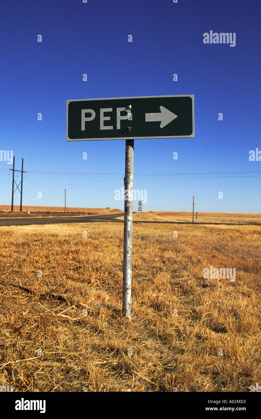 Crossroads intersection on farm to market road sign pointing to Pep Texas Stock Photo
