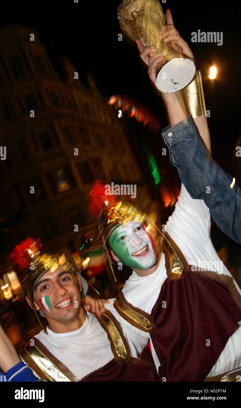 Italian fans celebrating in Piccadilly Circus after winning 2006 World Cup final vs France, London Stock Photo