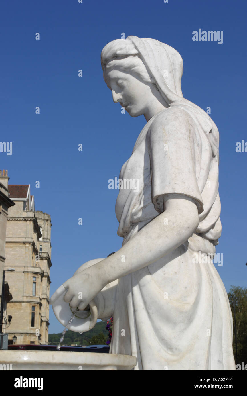 Statue woman pouring water fountain hi-res stock photography and images