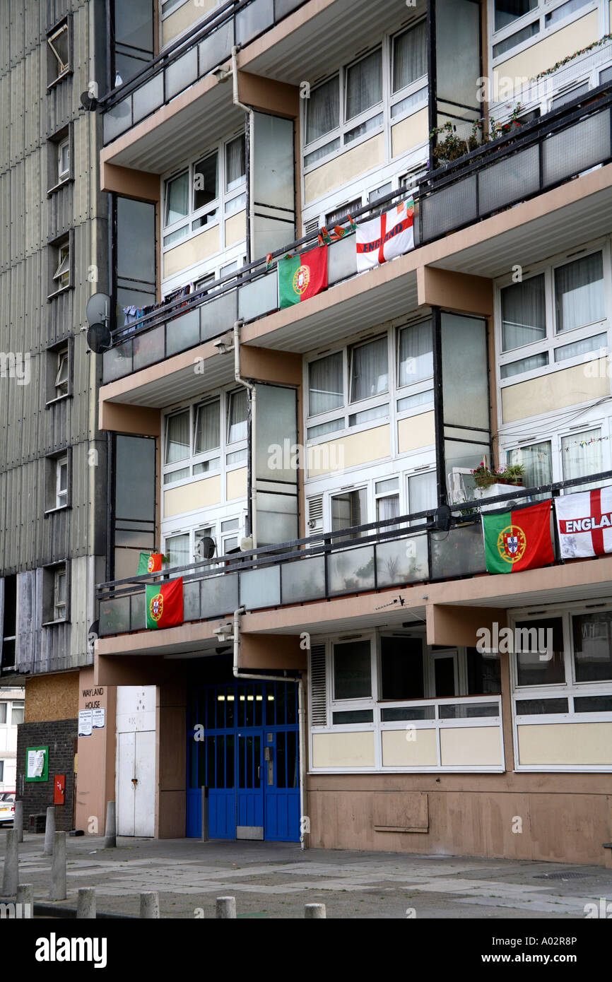 England's Cross of St. George and Portugal flags flying from block of flats in South London during 2006 World Cup Finals Stock Photo