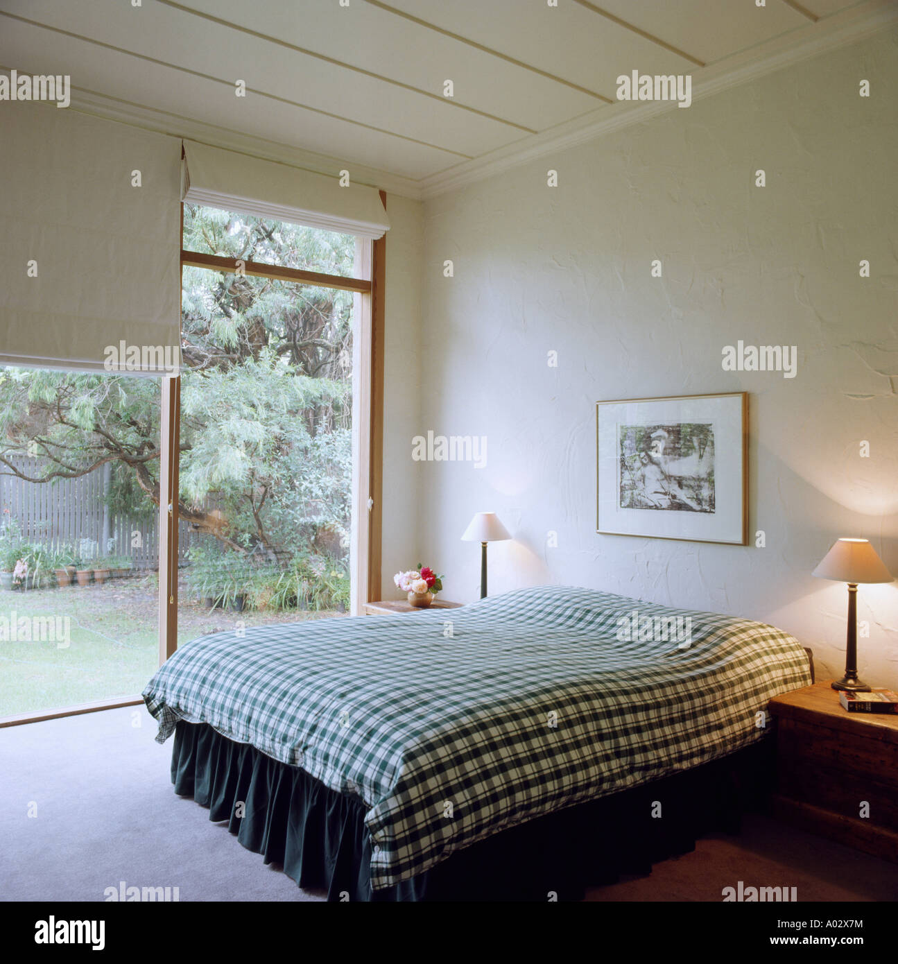 Check Duvet On Bed In Modern Bedroom With White Blinds And