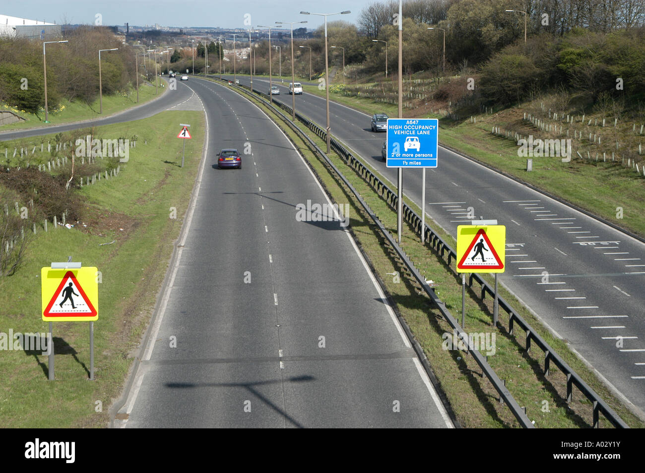 High occupancy vehicle lane sign to encourage car sharing among commuting drivers in the uk Stock Photo