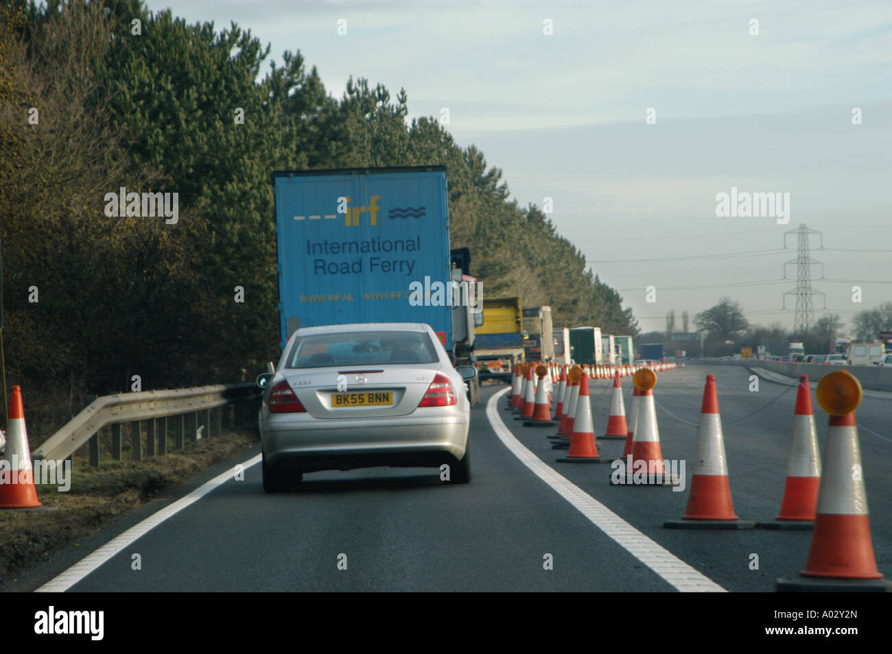 Contraflow Driving driving through a contraflow on a motorway in the uk Stock Photo - Alamy