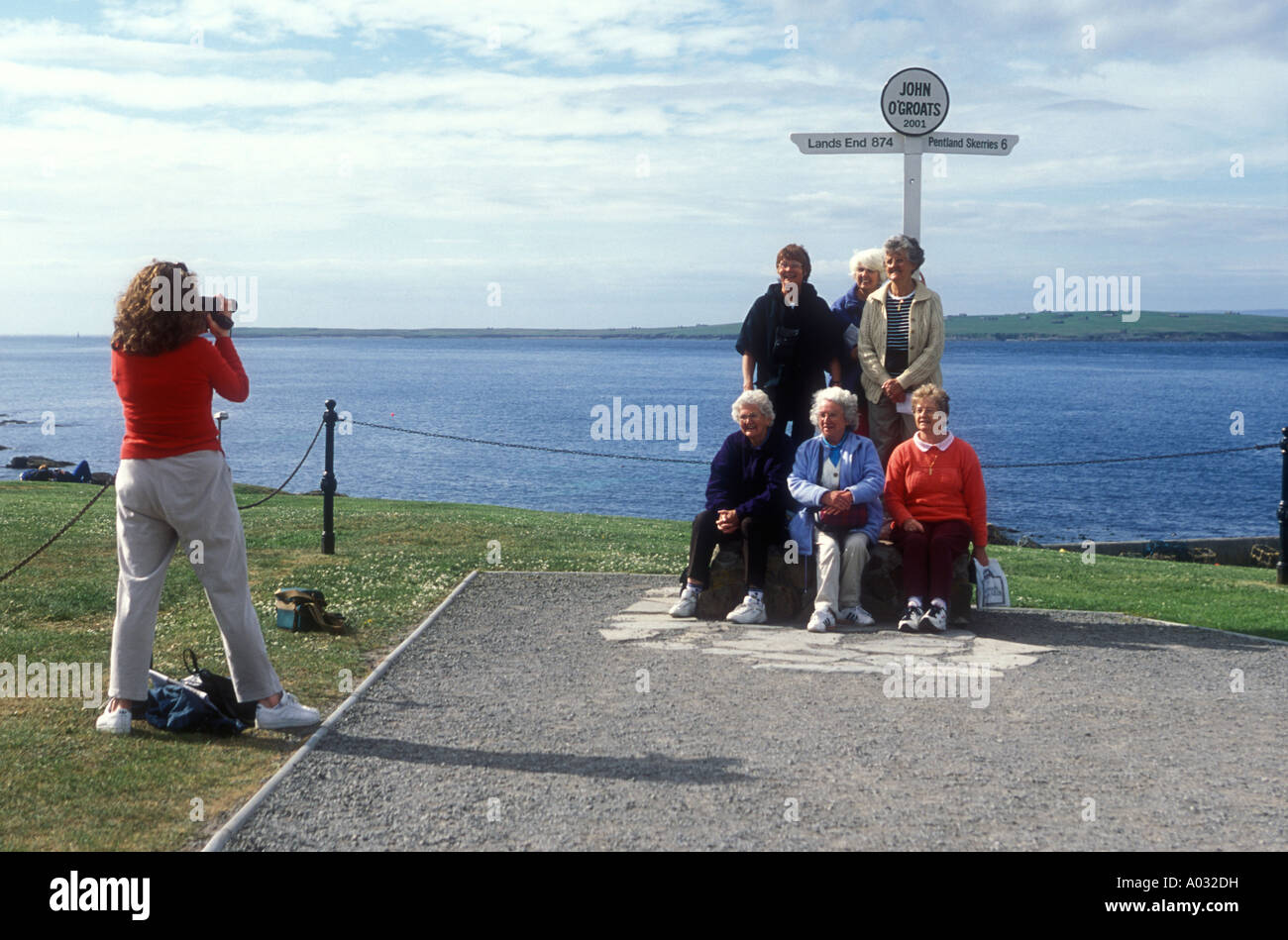 Tourists at John O Groats Scotland Stock Photo
