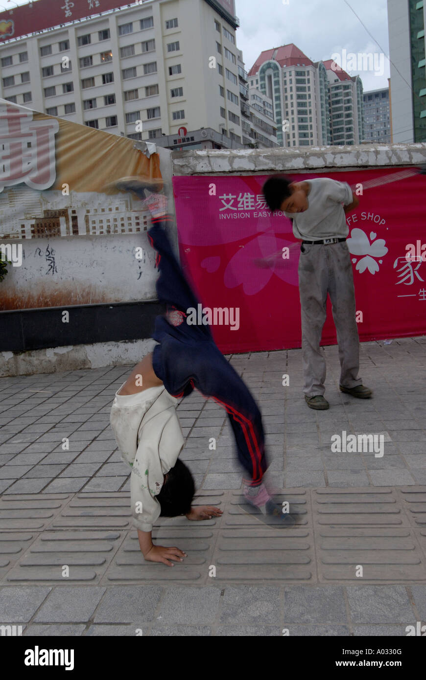 Chinese boys showing their kung fu skills on Kunming streets Yunnan ...