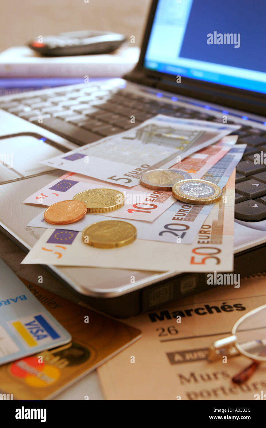 Internet shopping with Euros, Computer and Credit Cards. Stock Photo