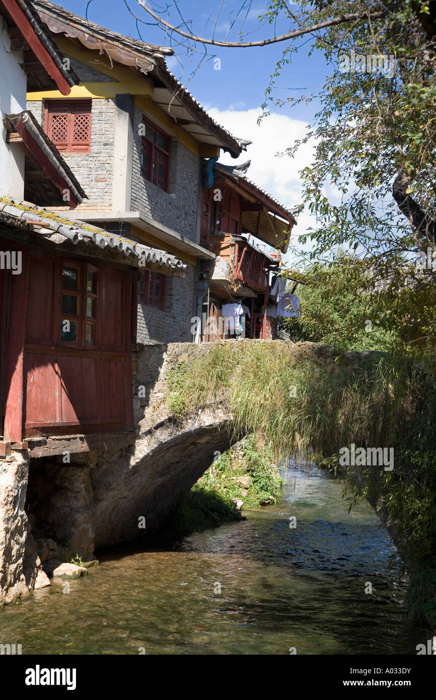 Quaint bridge over canal in Lijiang China Stock Photo