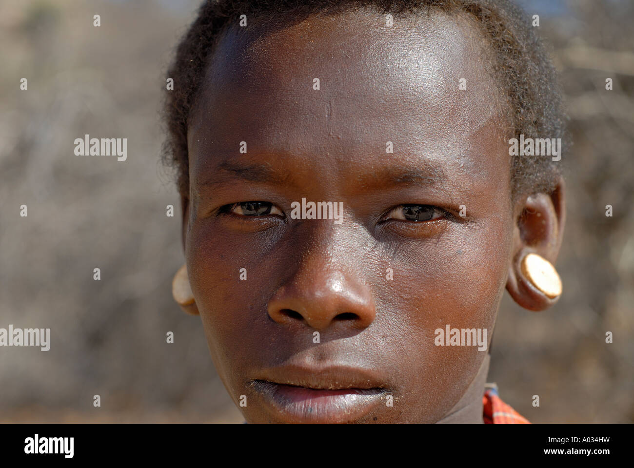 Portrait of Samburu boy wearing genuine tribal ornaments and ivory ...