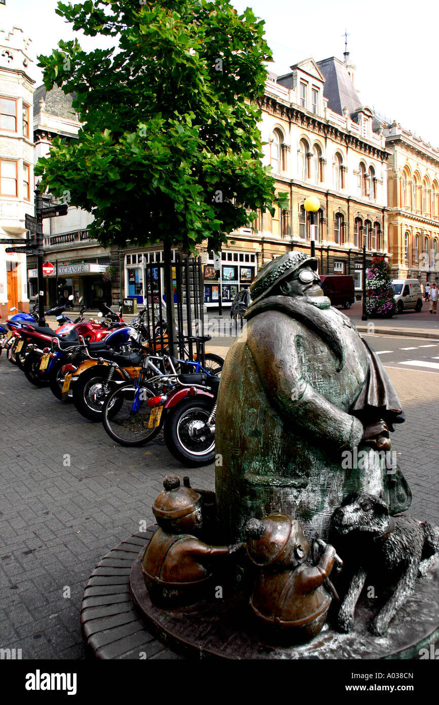 A statue in the Cornhill area of Ipswich Suffolk celebrating the life of famous newspaper cartoonist Giles Stock Photo