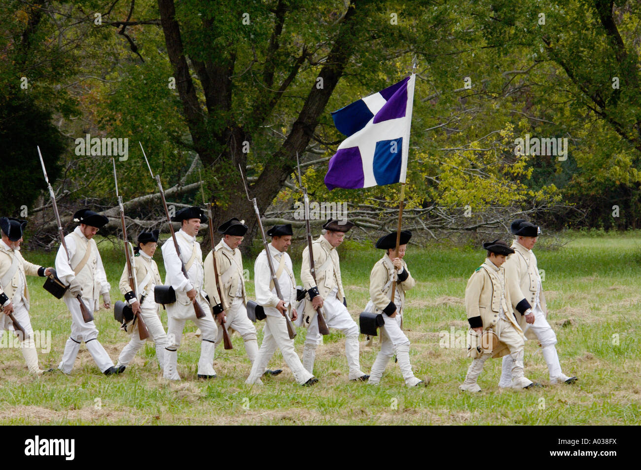 French army reenactors march to the surrender ceremony at Yorktown