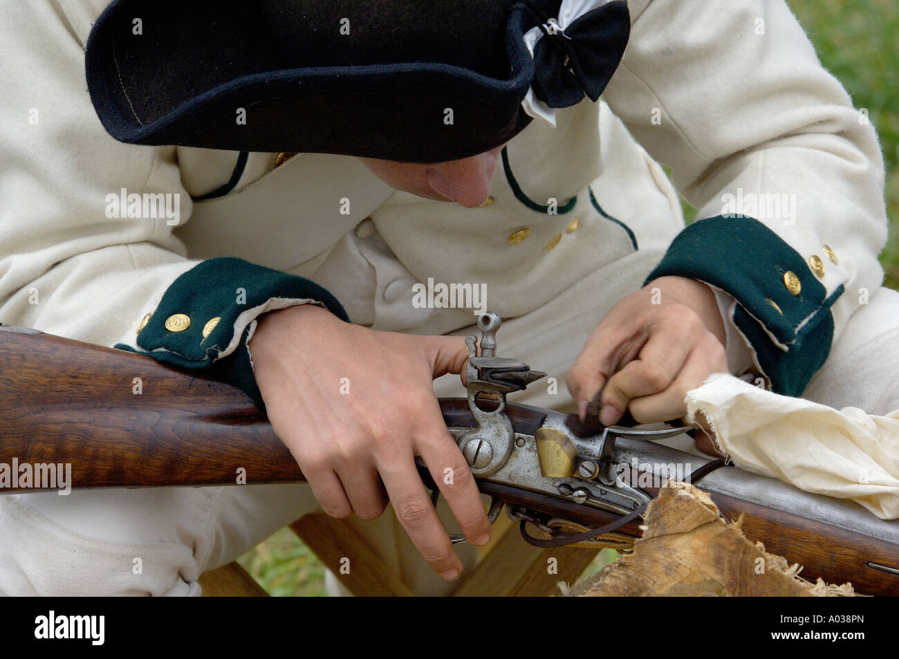 French soldier cleaning his musket at a reenactment on the Yorktown Battlefield Virginia. Digital photograph Stock Photo