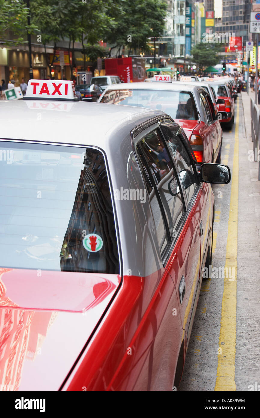 Taxis At Rank, Causeway Bay, Hong Kong Stock Photo