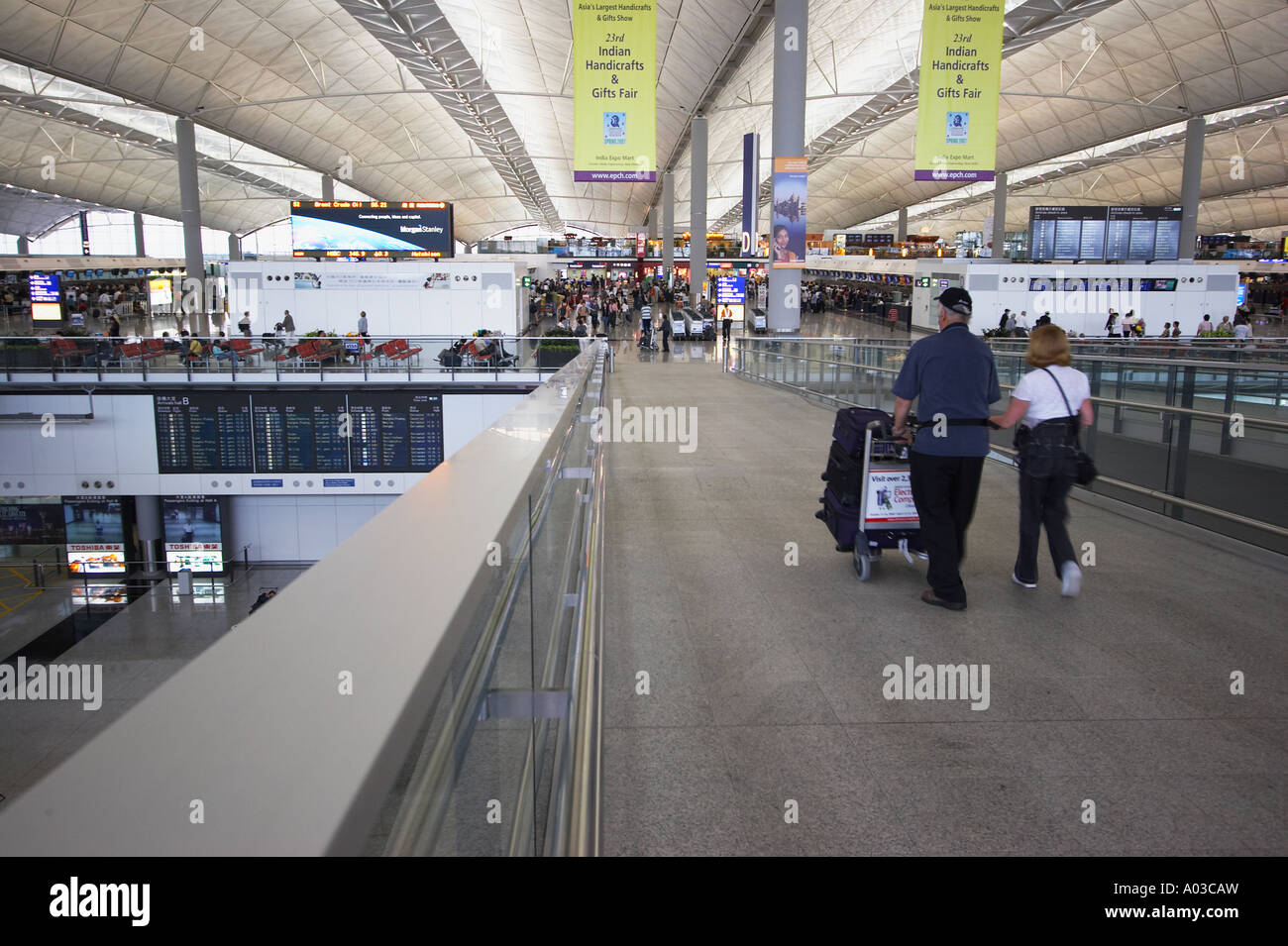 Passengers Walking Into Hong Kong International Airport Stock Photo - Alamy