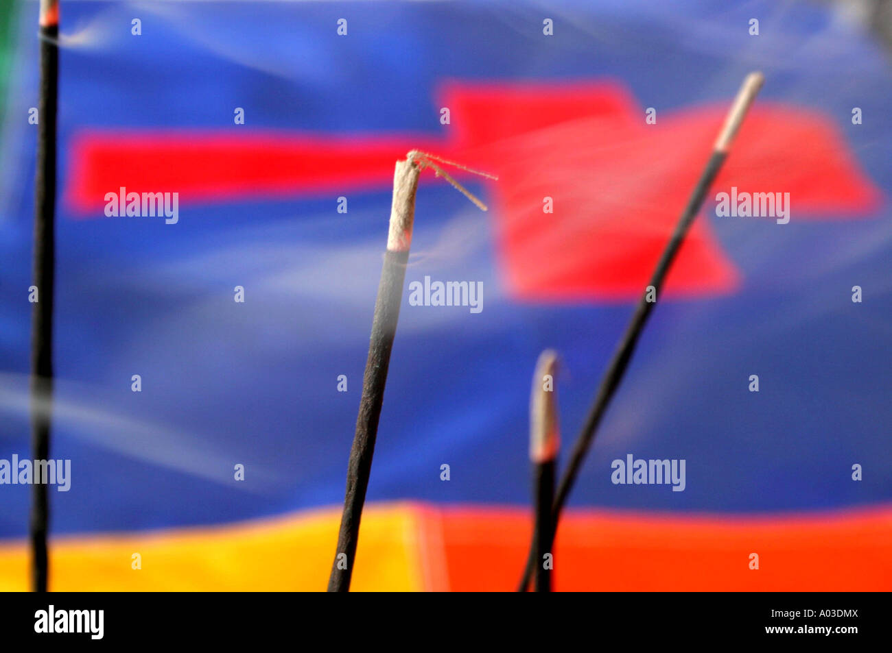 Incense sticks and cross Stock Photo Alamy