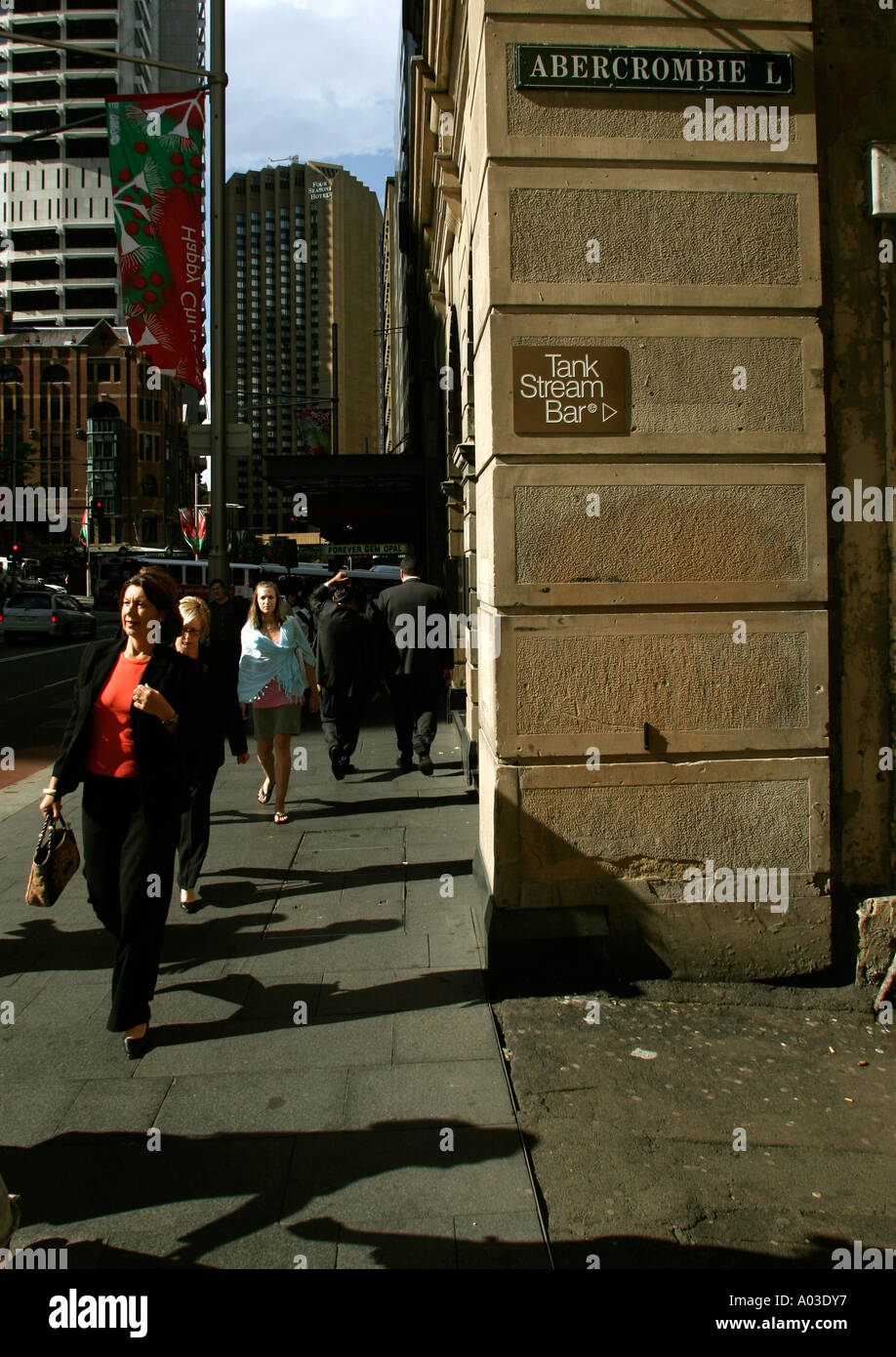 Pedestrians in George street Sydney pass by Abercrombie lane and the historic Tank Stream Bar Stock Photo