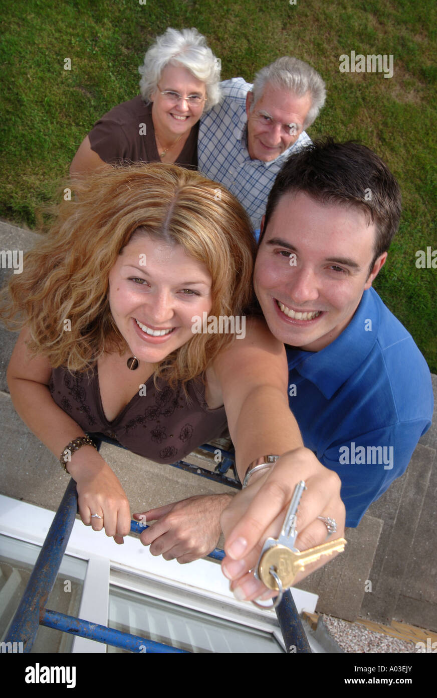 A YOUNG COUPLE ON THE PROPERTY LADDER UK Stock Photo