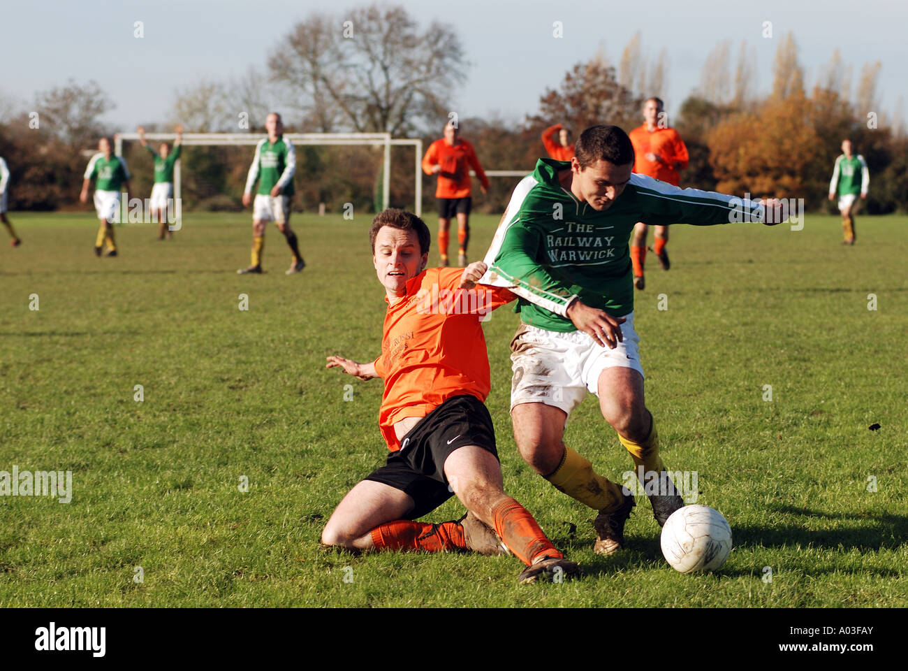 Sport football action shirt pulling fouling hires stock photography