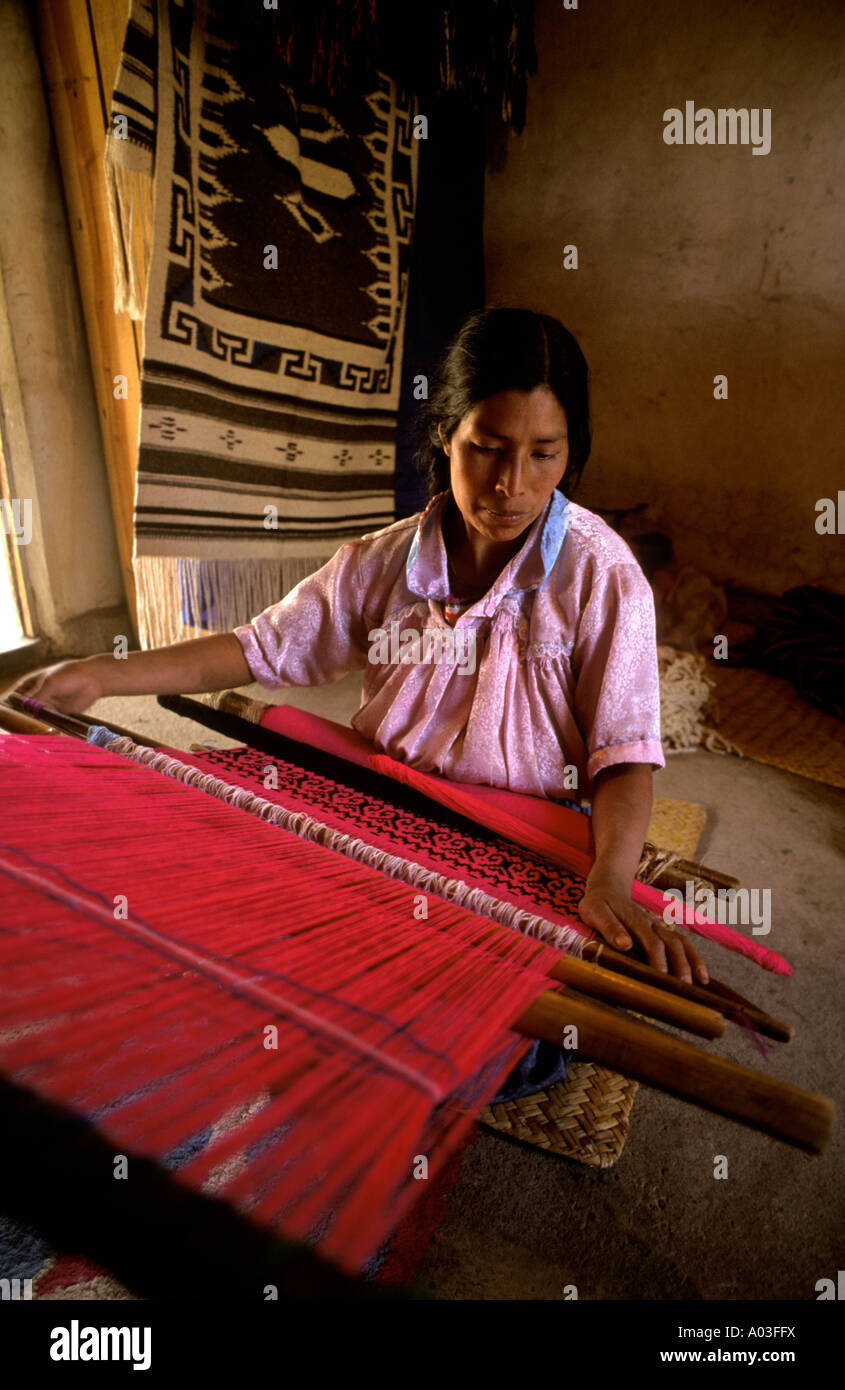 Stock image of a Tarascan indian woman weaving on a backstrap loom near Paricutin Volcano Mexico Stock Photo