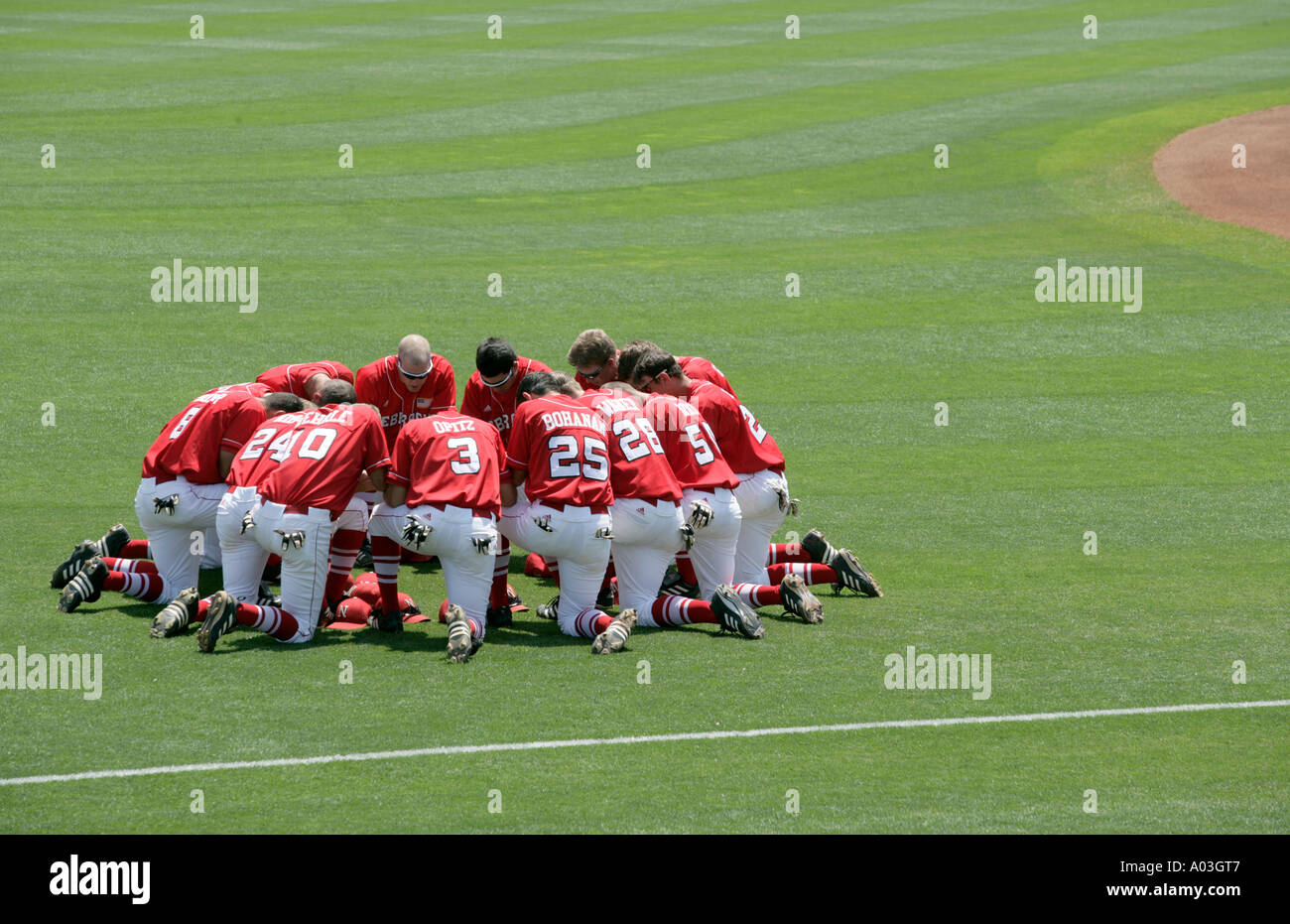 Nebraska baseball team huddle Stock Photo Alamy