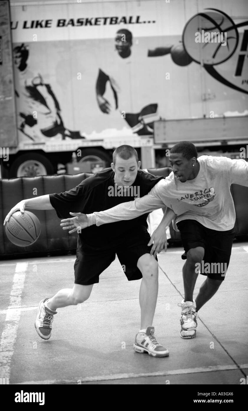 Basketball players in motion Stock Photo Alamy