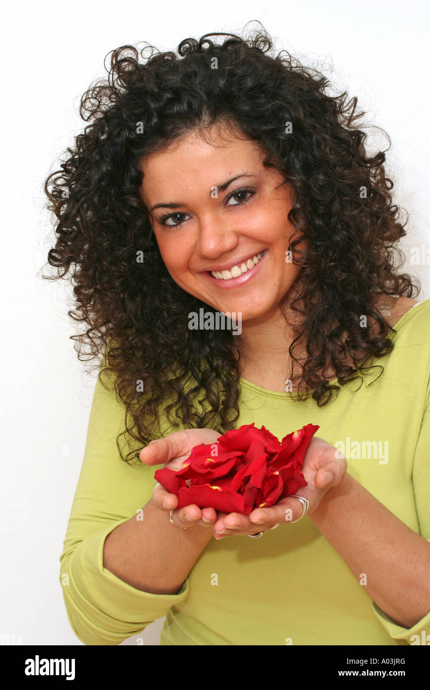 Rose petals and girl Stock Photo
