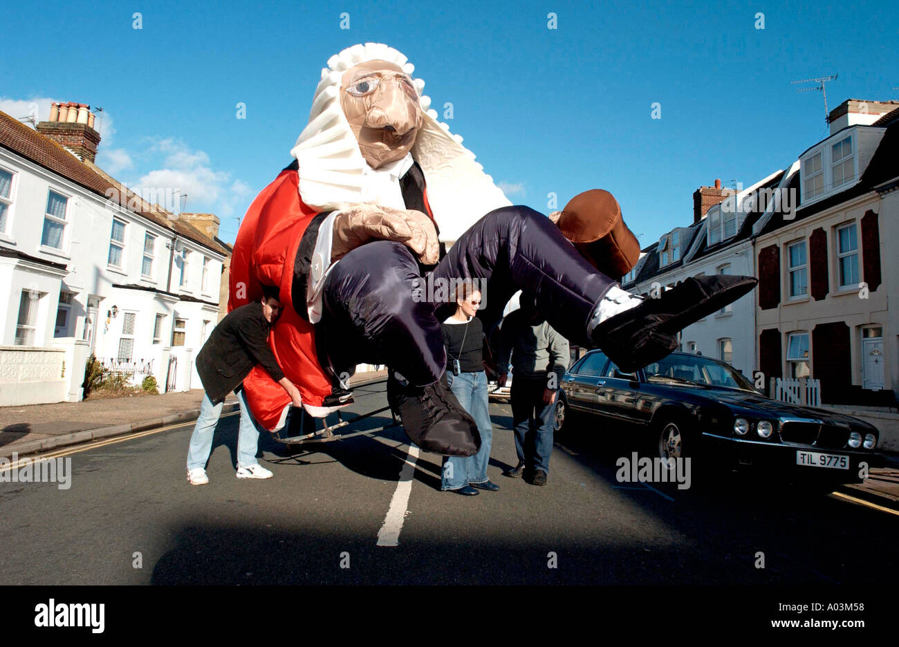 Here comes the wacky Judge. A huge Legal eagle is made ready for carnival parade Stock Photo