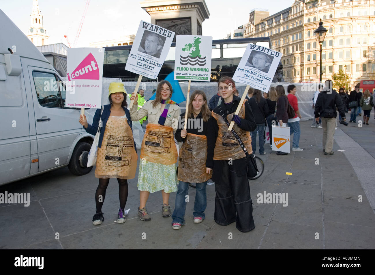 Young women protesters with Climate Change placards at Stop Climate Chaos Rally London 2006 Stock Photo