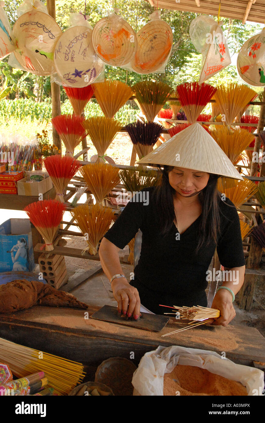 Woman making incense sticks village of Tu Duc Central Vietnam Stock