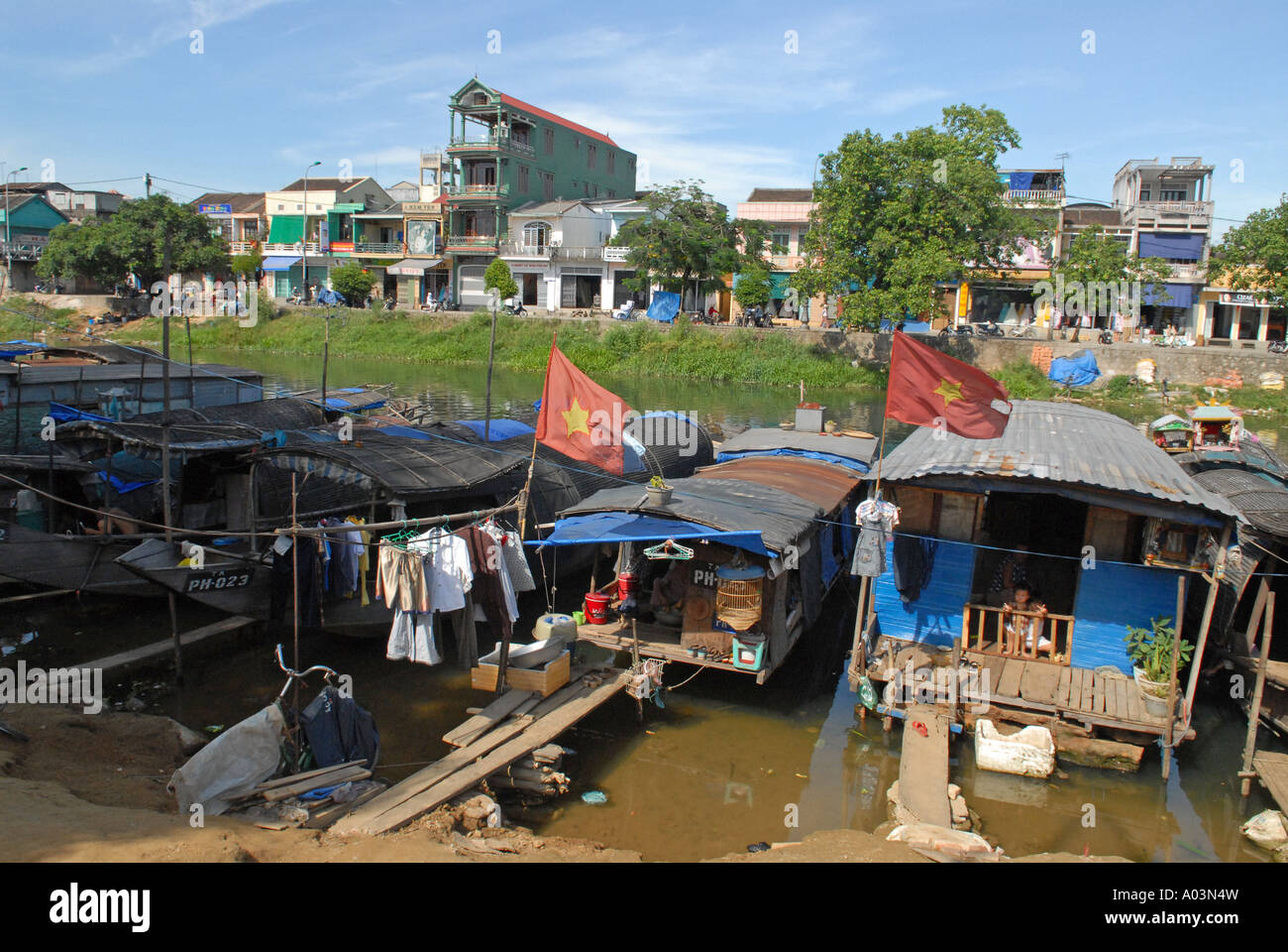Poor Hué city people live in Sampans settlements located on the shores of a Canal leading to the Perfume river Vietnam Stock Photo