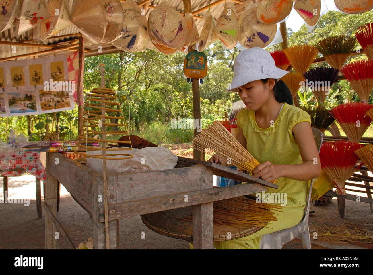 Worker rolling incense sticks Tu Duc Village Central Vietnam Stock